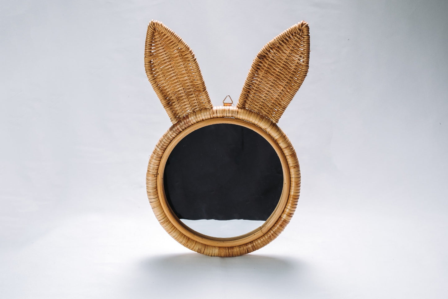 Rattan bunny mirror