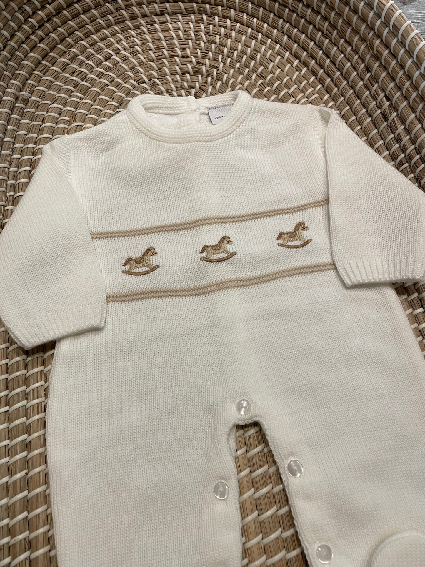 The rocking horse knitted onesie