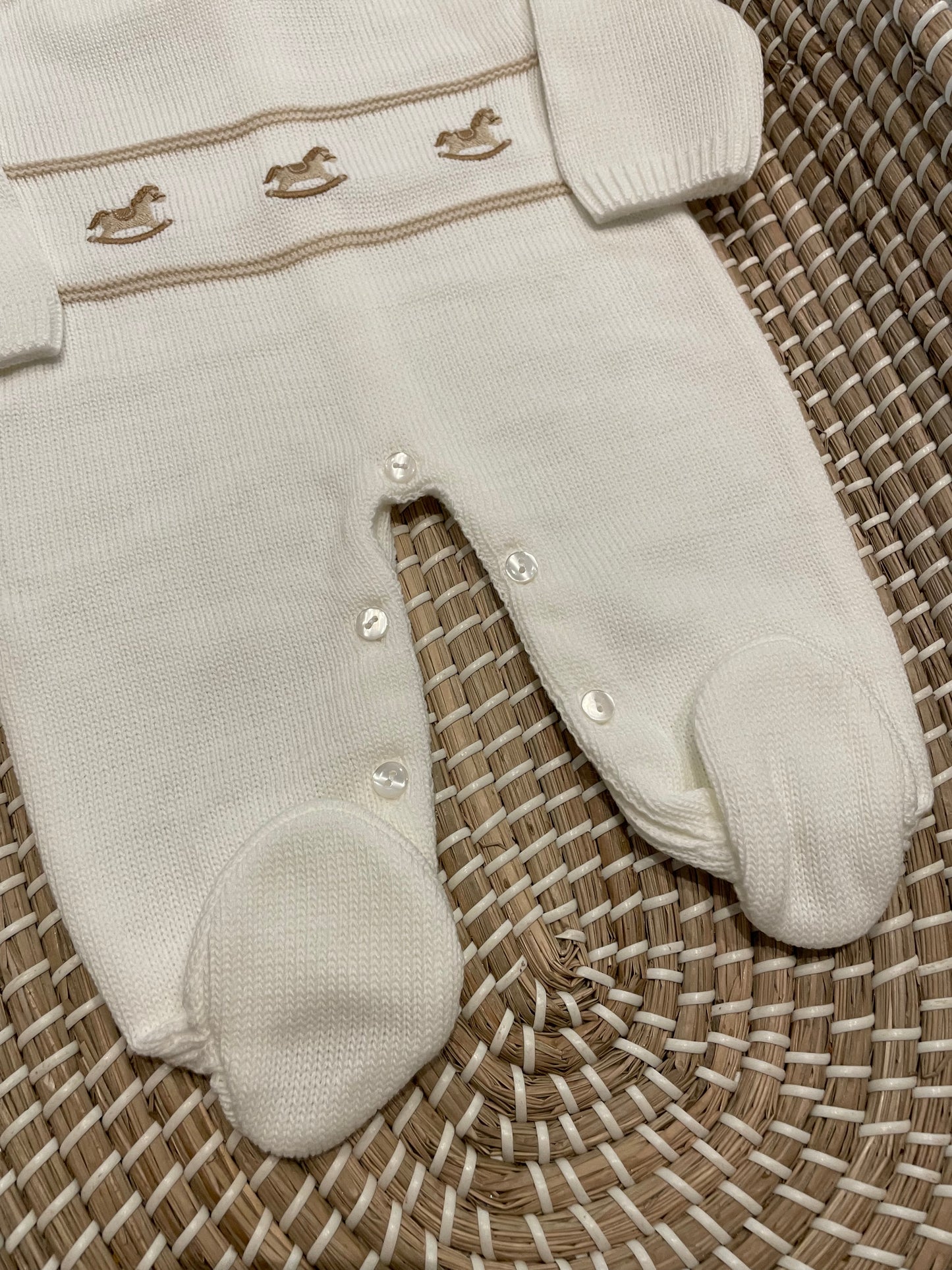 The rocking horse knitted onesie