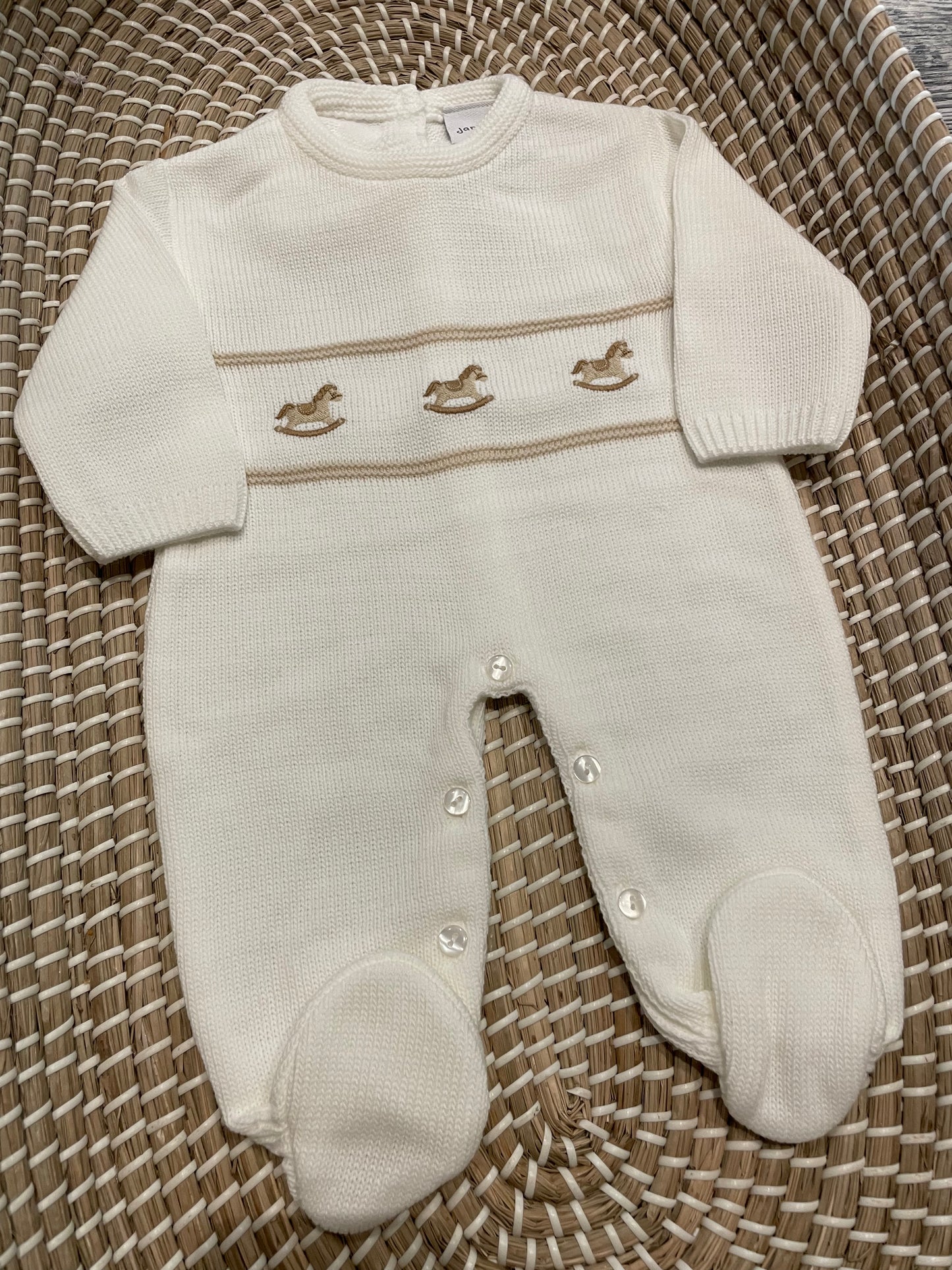The rocking horse knitted onesie