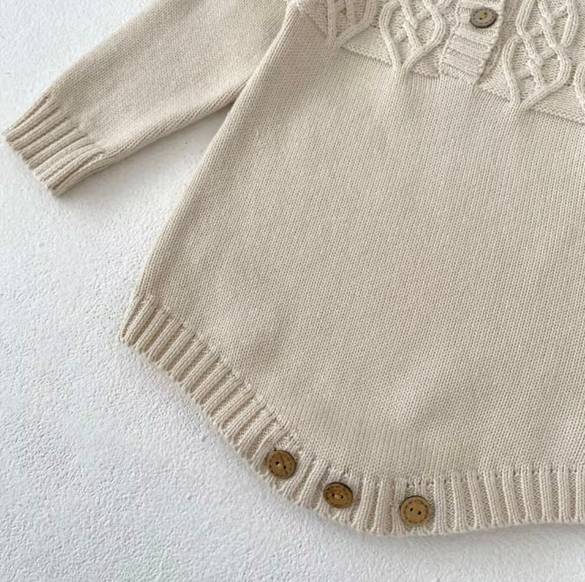 Beige knitted romper