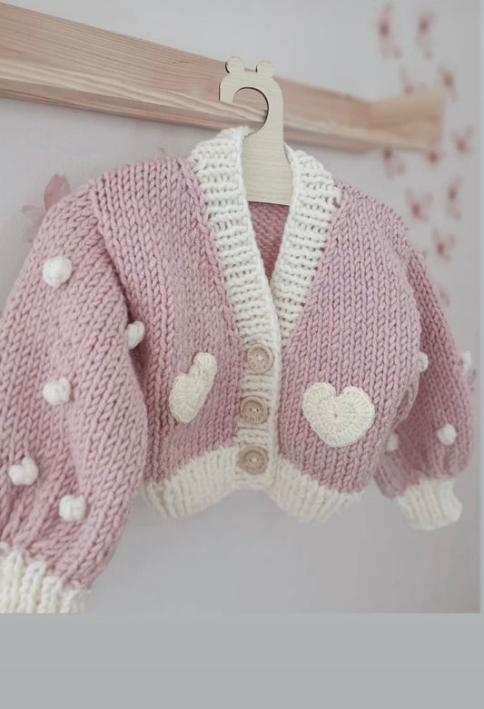 Chunky hand knitted pink heart cardigan