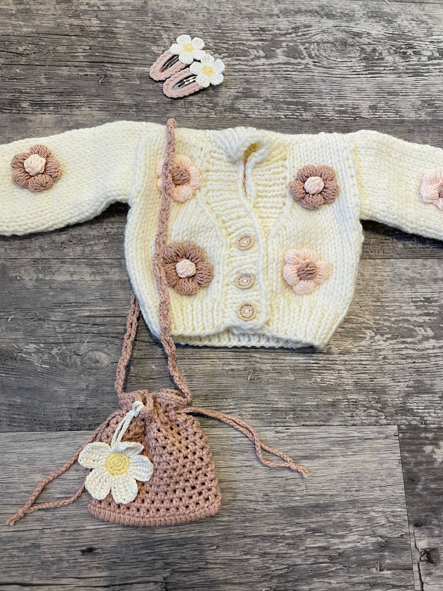 Chunky hand knitted cream flower cardigan