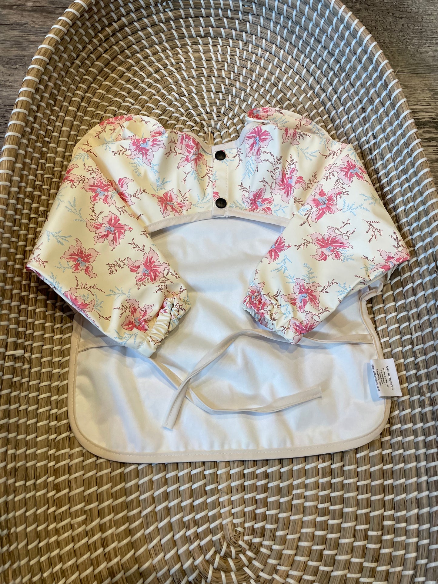 Long sleeved frill bib - white floral