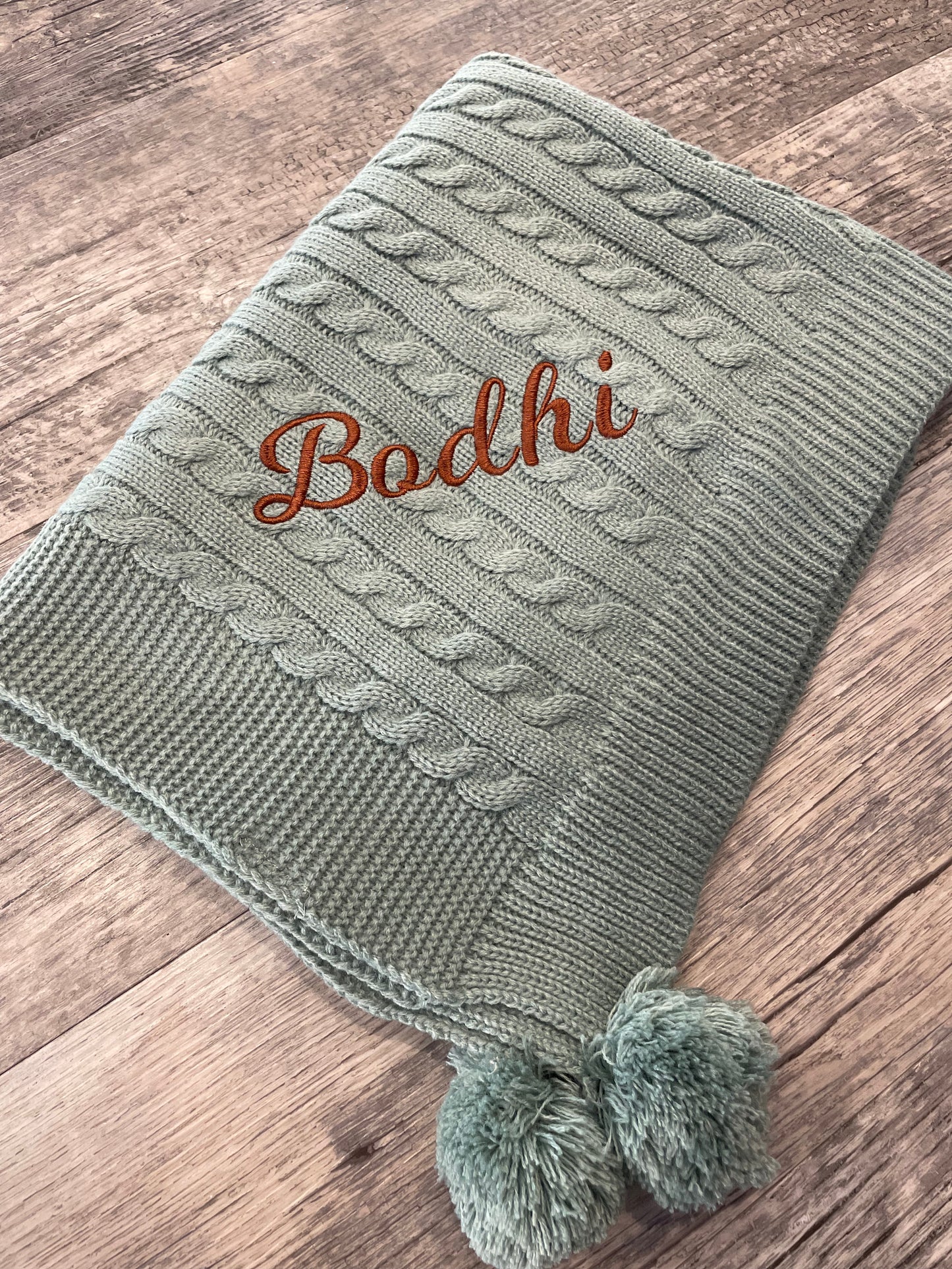 Personalised sage green cable knit wrap blanket